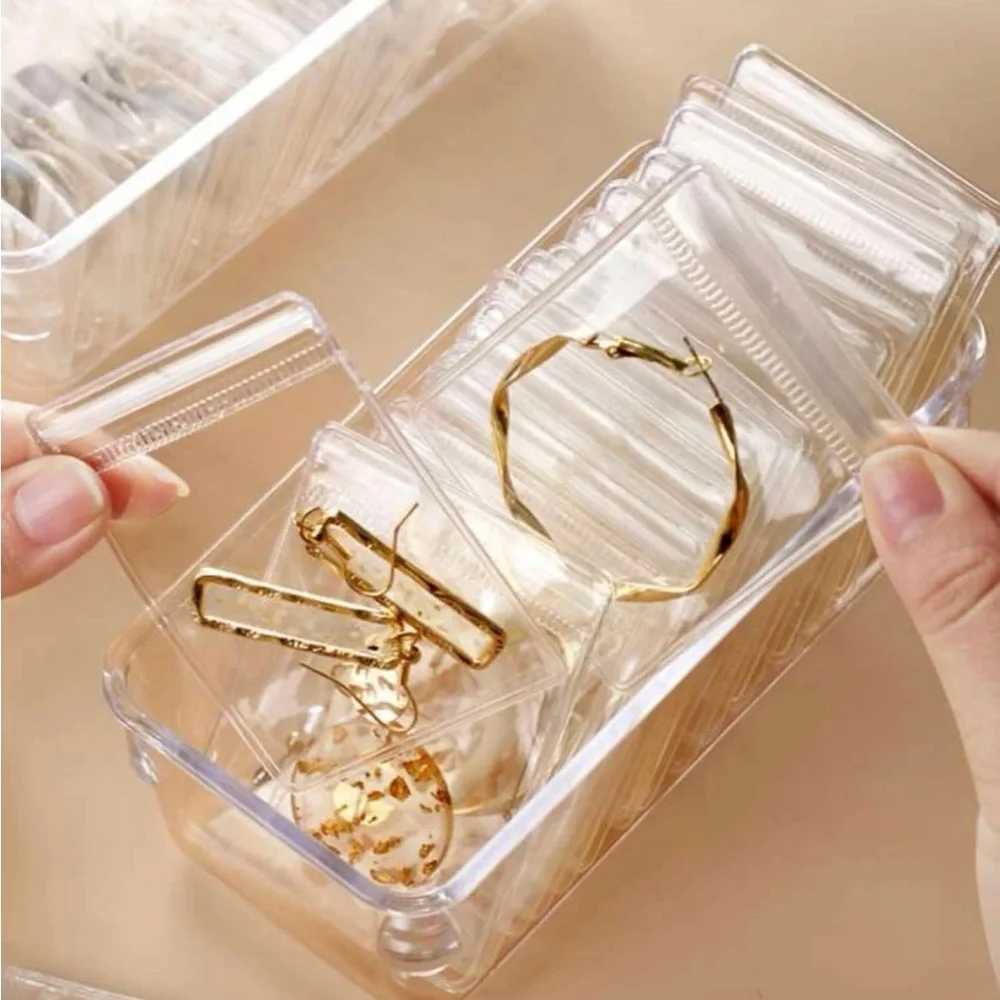 Jewelry box organizer tray with clear storage zipped bags. Perfect for drawers